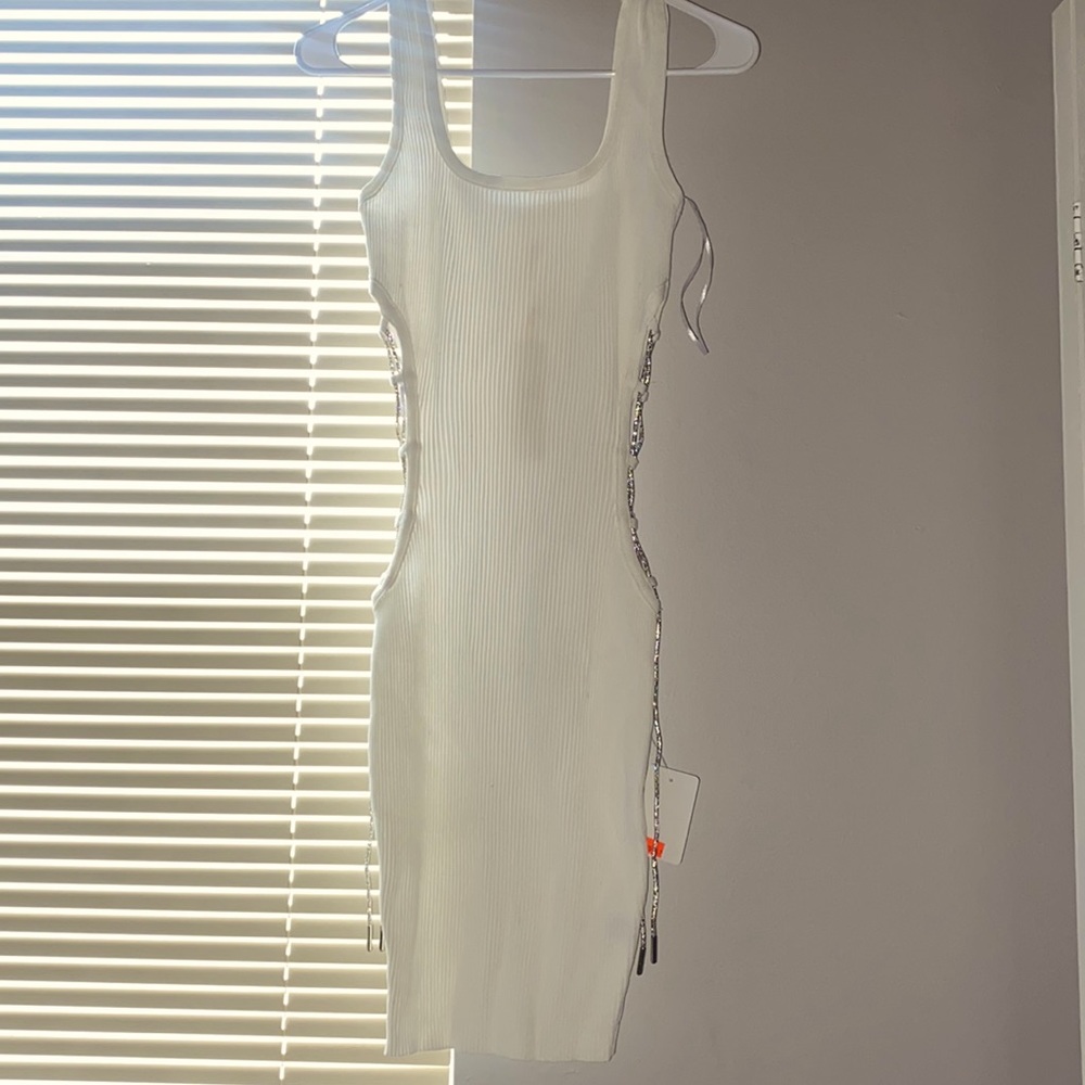 white opened sided dress